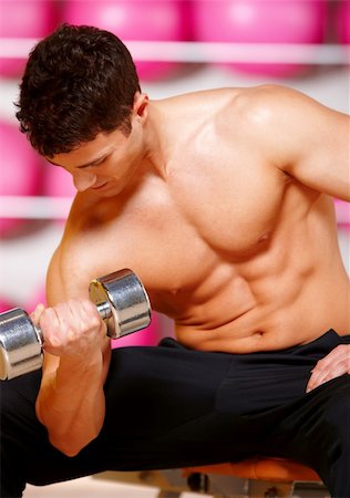 simsearch:400-05268701,k - Handsome man at the gym doing exercises Foto de stock - Super Valor sin royalties y Suscripción, Código: 400-05875775