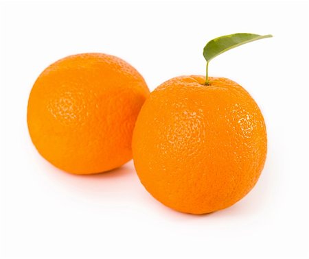 simsearch:400-04716078,k - orange fruits with green leaves on white Stock Photo - Budget Royalty-Free & Subscription, Code: 400-05876251