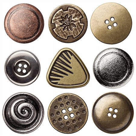 Vintage metal sewing buttons, isolated Stock Photo - Budget Royalty-Free & Subscription, Code: 400-05878932