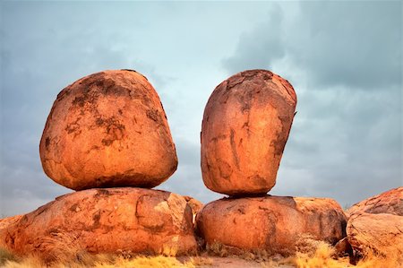 granite eroded red rock formation, big stone pebbles geology by erosion Devils Marbles Northern Territory Austrlia landmark in Aboriginal culture tourism destination in outback Stock Photo - Budget Royalty-Free & Subscription, Code: 400-05885631