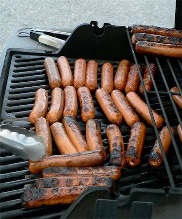 simsearch:400-04587885,k - Hotdogs on a barbeque grill. Stock Photo - Budget Royalty-Free & Subscription, Code: 400-05885970