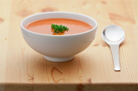 Spanish cold tomato based soup gazpacho served in a white bowl Stock Photo - Budget Royalty-Free & Subscription, Code: 400-05886302