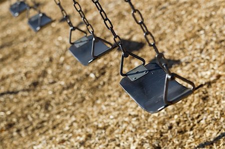 A set of empty playground swings Stock Photo - Budget Royalty-Free & Subscription, Code: 400-05886456