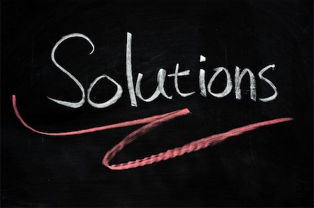 Solutions written with chalk on blackboard Stock Photo - Budget Royalty-Free & Subscription, Code: 400-05886942