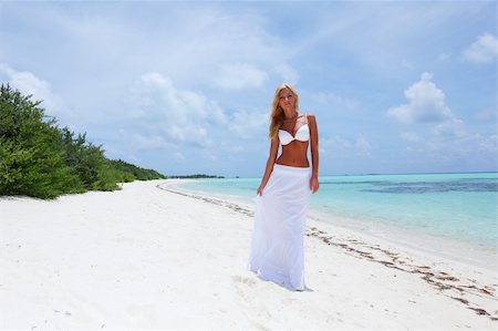 sandi model - woman in bikini on sea beach Stock Photo - Budget Royalty-Free & Subscription, Code: 400-05887952