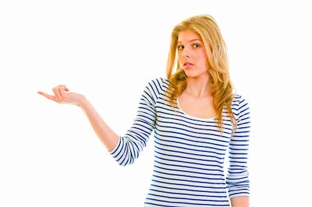 simsearch:400-05888428,k - Confused teen girl pointing in corner Stock Photo - Budget Royalty-Free & Subscription, Code: 400-05888426