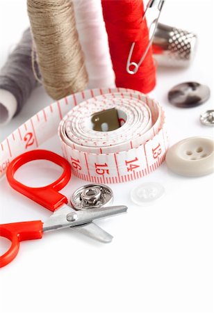 tools for needlework thread scissors and tape measure isolated on white background Stock Photo - Budget Royalty-Free & Subscription, Code: 400-05889522