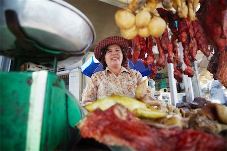 self-employed (female) - Asian woman selling meat, beef, pork and chicken at street restaurant in Phnom Penh, Cambodia Stock Photo - Budget Royalty-Free & Subscription, Code: 400-05881040