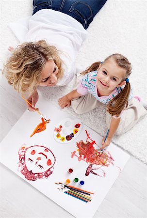 Painting with mom - little girl with brush and colors Stock Photo - Budget Royalty-Free & Subscription, Code: 400-05882478