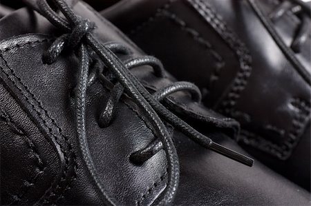 simsearch:700-00157050,k - Macro view of men black shoes and black laces Stock Photo - Budget Royalty-Free & Subscription, Code: 400-05883280