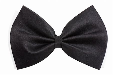 closeup view of black bowtie isolated over white background Stock Photo - Budget Royalty-Free & Subscription, Code: 400-05883283