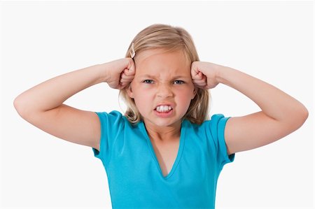 simsearch:400-06363059,k - Unhappy girl with the fists on her face against a white background Stock Photo - Budget Royalty-Free & Subscription, Code: 400-05895559
