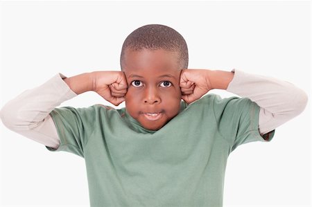simsearch:400-06363059,k - Boy with the fists on his face against a white background Stock Photo - Budget Royalty-Free & Subscription, Code: 400-05895631