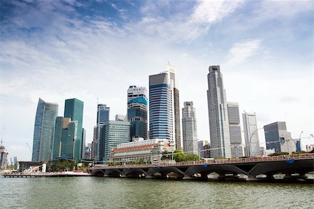 Singapore skyline of financial district with modern office buildings and Merlion Park as seen from Esplanade. Stock Photo - Budget Royalty-Free & Subscription, Code: 400-05895905