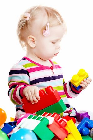 simsearch:400-04847852,k - Little baby girl playing with balls isolated on white Stock Photo - Budget Royalty-Free & Subscription, Code: 400-05896146