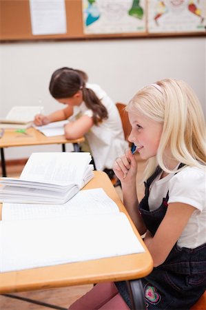 simsearch:400-05896357,k - Portrait of pupils doing classwork in a classroom Stock Photo - Budget Royalty-Free & Subscription, Code: 400-05896359