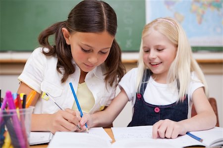 simsearch:6109-06196438,k - Pupils working together in a classroom Stock Photo - Budget Royalty-Free & Subscription, Code: 400-05896366