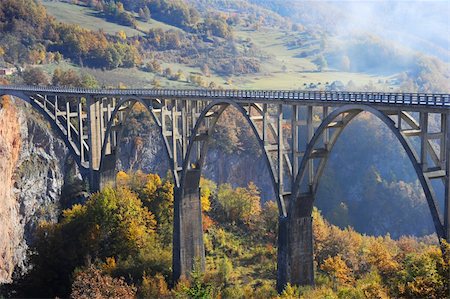 Djurdjevica Tara Bridge is a concrete arch bridge over the Tara River in northern Montenegro. It was built between 1937 and 1940, it's 365m long and the roadway stands 172 metres above the river. Stock Photo - Budget Royalty-Free & Subscription, Code: 400-05896458
