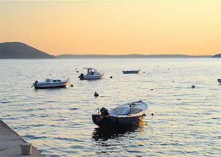 simsearch:400-07748817,k - Fishing boats in Herceg Novi harbor at sunset. Montenegro Stock Photo - Budget Royalty-Free & Subscription, Code: 400-05896461