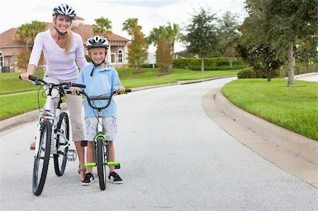 simsearch:400-05755734,k - A young family of woman and boy child, mother and son, cycling together. Photographie de stock - Aubaine LD & Abonnement, Code: 400-05898144
