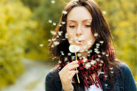 simsearch:400-04399510,k - Girl blowing on white dandelion in the forest Stock Photo - Budget Royalty-Free & Subscription, Code: 400-05899557