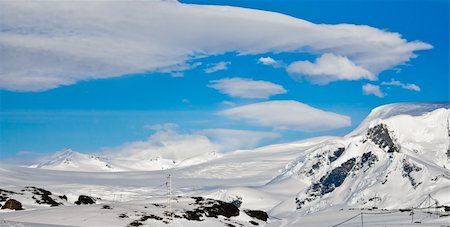 panoramic rock climbing images - Beautiful snow-capped mountains. Beautiful winter background. Foto de stock - Super Valor sin royalties y Suscripción, Código: 400-05899598