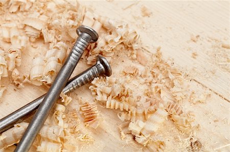 Wood surface, shavings and nails closeup Stock Photo - Budget Royalty-Free & Subscription, Code: 400-05890752