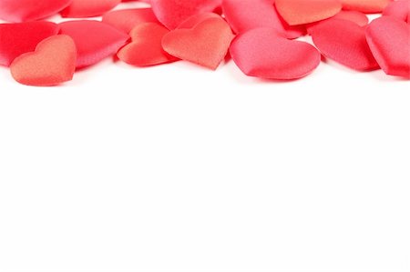Border made of heart shaped confetti on white background Stock Photo - Budget Royalty-Free & Subscription, Code: 400-05890962