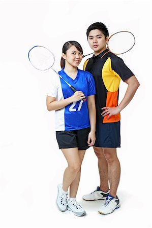 fitness asian couple - Young asian athletic couple isolated in solid background. Stock Photo - Budget Royalty-Free & Subscription, Code: 400-05891516