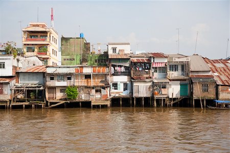 Slum area in Mytho in the Mekong Delta, Vietnam Stock Photo - Budget Royalty-Free & Subscription, Code: 400-05893594