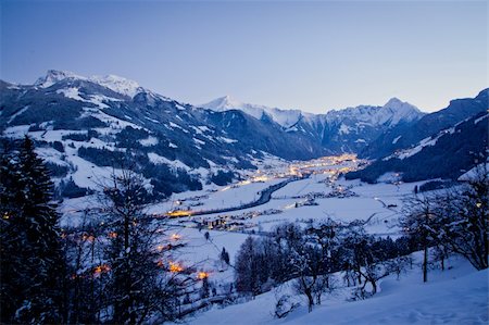 snowy austria village - Ski resort at night. Night view of the bird's-eye view of the valley of Zell am Ziller, Tirol, Austria Stock Photo - Budget Royalty-Free & Subscription, Code: 400-05905434