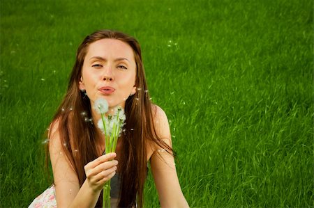 simsearch:400-04399510,k - Girl with dandelion on green field Stock Photo - Budget Royalty-Free & Subscription, Code: 400-05905846