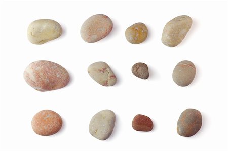 Collection of sea pebbles isolated on white background Stock Photo - Budget Royalty-Free & Subscription, Code: 400-05906317