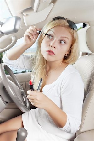 portrait of young beautiful woman sitting in the car Stock Photo - Budget Royalty-Free & Subscription, Code: 400-05906477