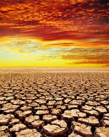 drought land under red clouds Stock Photo - Budget Royalty-Free & Subscription, Code: 400-05907152