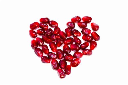 pomegranate seeds in the shape of a heart Stock Photo - Budget Royalty-Free & Subscription, Code: 400-05907968