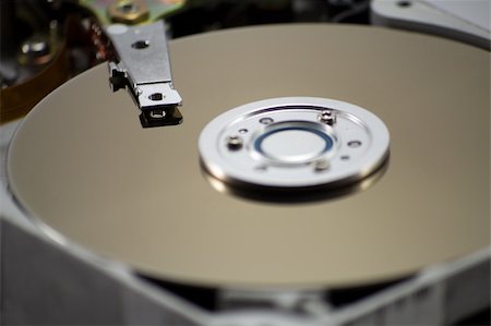simsearch:400-05252692,k - Detail of hard disk focused on head Stock Photo - Budget Royalty-Free & Subscription, Code: 400-05908965
