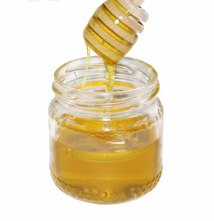 simsearch:400-05135233,k - jar of honey with stick on white background Foto de stock - Super Valor sin royalties y Suscripción, Código: 400-05909846