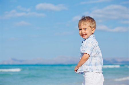 simsearch:400-04423521,k - Little cute boy on the beautiful exotic white beach, Mallorca, Spain Photographie de stock - Aubaine LD & Abonnement, Code: 400-05909858