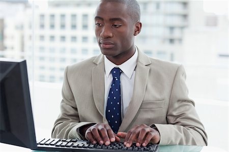 face to internet technology - Office worker using a computer in his office Stock Photo - Budget Royalty-Free & Subscription, Code: 400-05900702