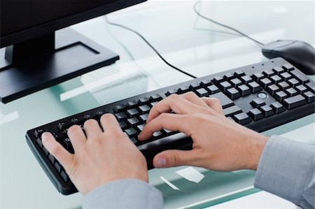 simsearch:400-04350023,k - Masculine hands typing on a keyboard Stock Photo - Budget Royalty-Free & Subscription, Code: 400-05900851