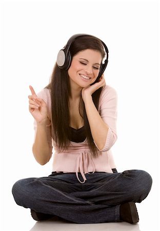 disc jockey radio - beautiful brunette listening to music on white background Stock Photo - Budget Royalty-Free & Subscription, Code: 400-05901147