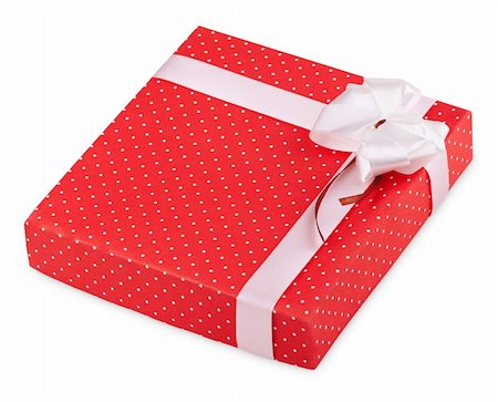 simsearch:400-04304378,k - Little red gift with ribbon isolated on white background Photographie de stock - Aubaine LD & Abonnement, Code: 400-05902129