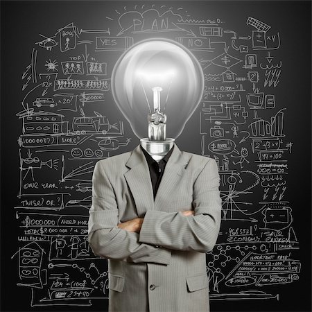 symbol for intelligence - lamp head businessman have got an idea Stock Photo - Budget Royalty-Free & Subscription, Code: 400-05902758