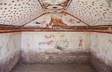simsearch:400-04032243,k - Tarquinia, Italy, around 470 B.C. Via a narrow corridor leading downstair one has access to the rectangular burial room with a sloping ceiling Stock Photo - Budget Royalty-Free & Subscription, Code: 400-05902877