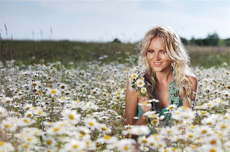 beautiful girl on the daisy flowers field Stock Photo - Budget Royalty-Free & Subscription, Code: 400-05914130