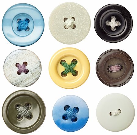 Various sewing buttons with a thread. Stock Photo - Budget Royalty-Free & Subscription, Code: 400-05917242