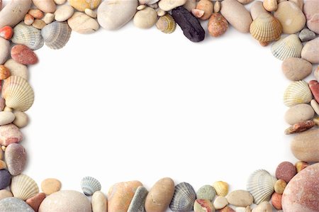 Frame made of sea pebbles and shells on white background Stock Photo - Budget Royalty-Free & Subscription, Code: 400-05919435