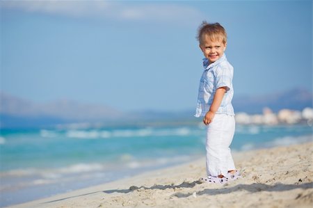 simsearch:400-04423521,k - Little cute boy on the beautiful exotic white beach, Mallorca, Spain Photographie de stock - Aubaine LD & Abonnement, Code: 400-05910275