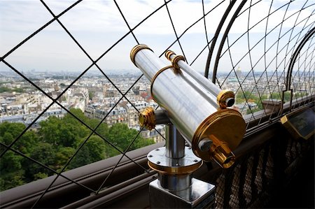 simsearch:400-04564562,k - Telescope on top floor of Eiffel Tower in Paris, France. Useful file for your brochure, flyer or website about France sightseeing. Stock Photo - Budget Royalty-Free & Subscription, Code: 400-05910745